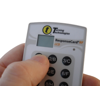 Hand holding electronic voting device response system for conferences meetings exhibitions Dubai Abu Dhabi UAE GCC events